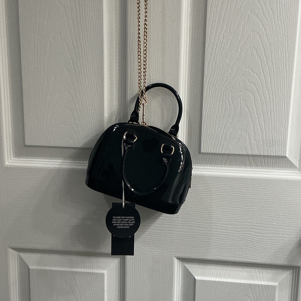 Sleek Black Mini Bag with Gold Chain